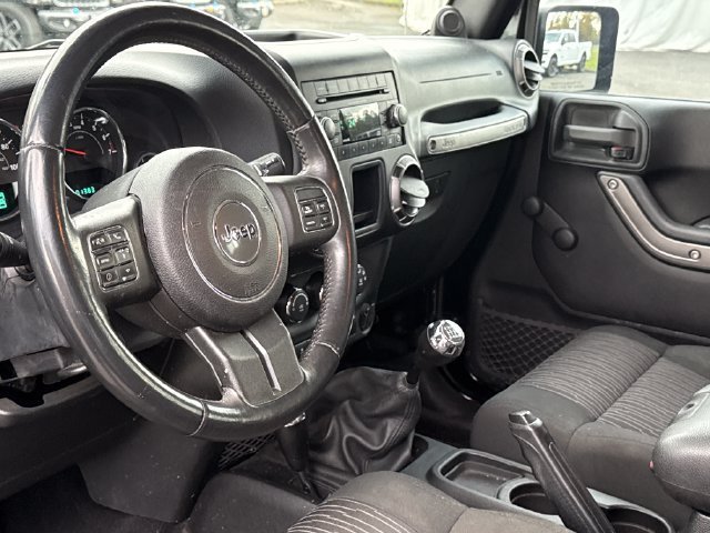 Used 2012 Black Clearcoat Jeep Unlimited Sport image 12
