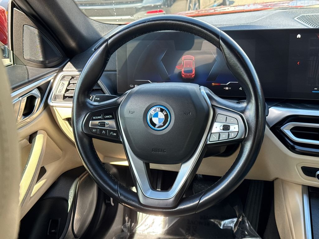 Certified Used 2023 Sunset Orange Metallic BMW eDrive35 image 21