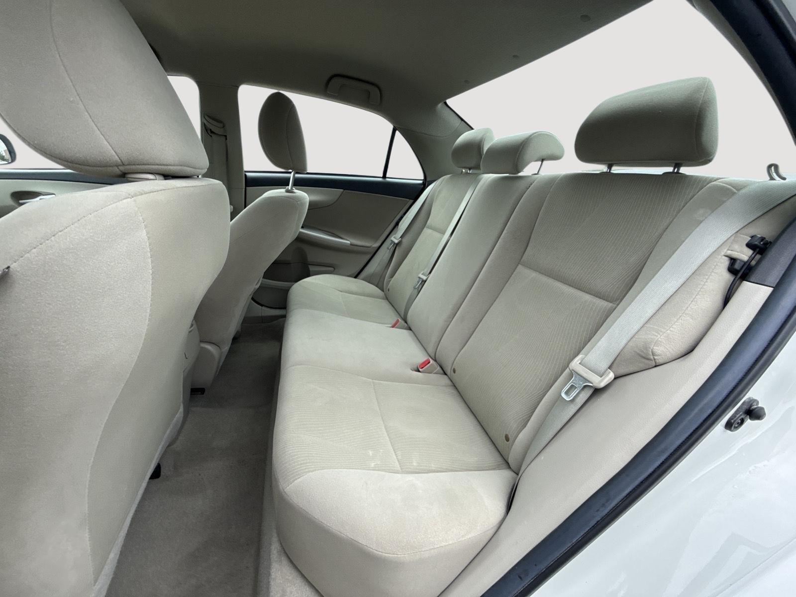 Used 2013 Super White Toyota LE image 22