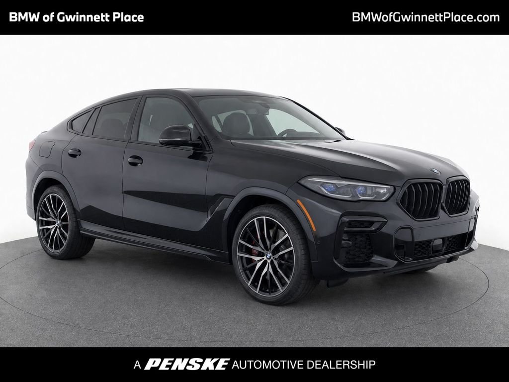 Certified Used 2023 Black Sapphire Metallic BMW xDrive40i image 1