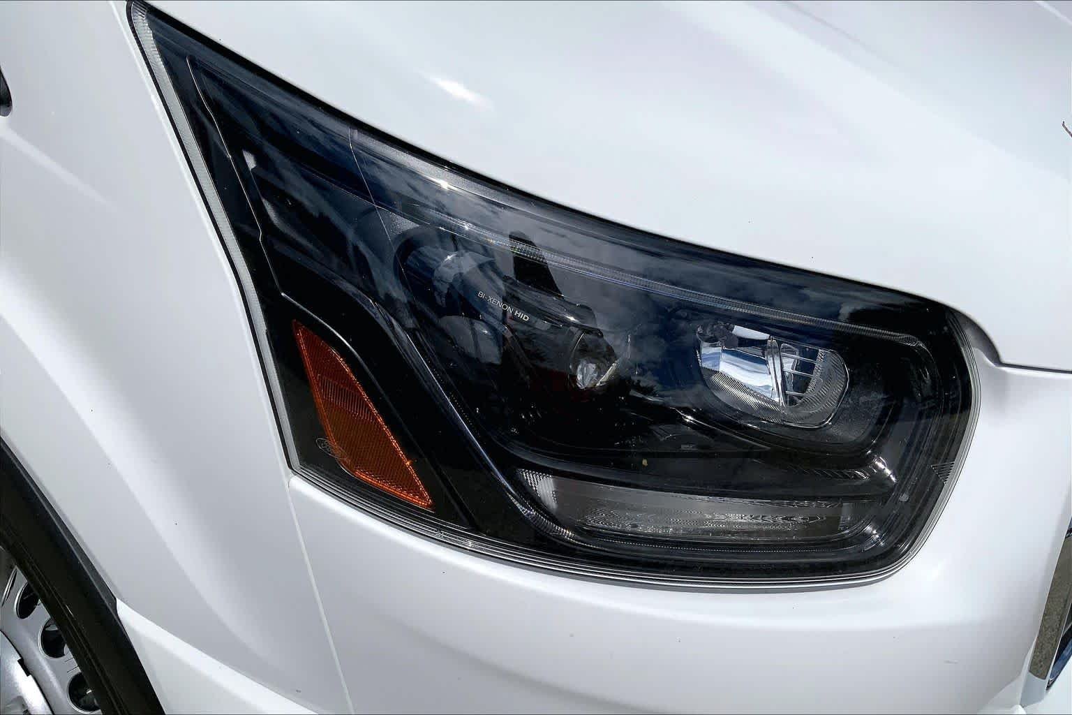 New 2026 Oxford White Ford Passenger Van XLT image 13