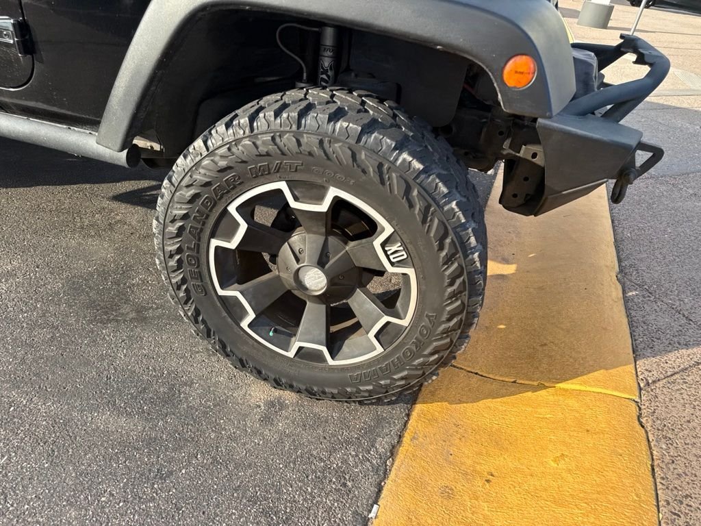 Used 2011 Black ClearCoat Jeep Unlimited Rubicon image 6
