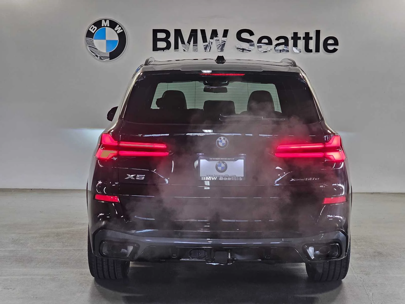 New 2026 Black Sapphire Metallic BMW xDrive50e image 5