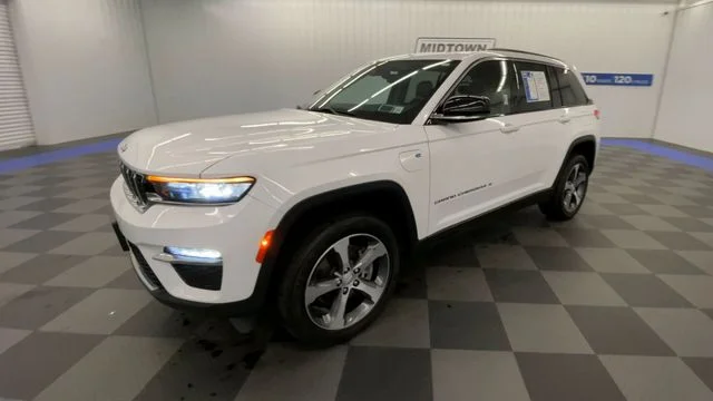 Used 2023 Bright White Clearcoat Jeep 4xe image 4