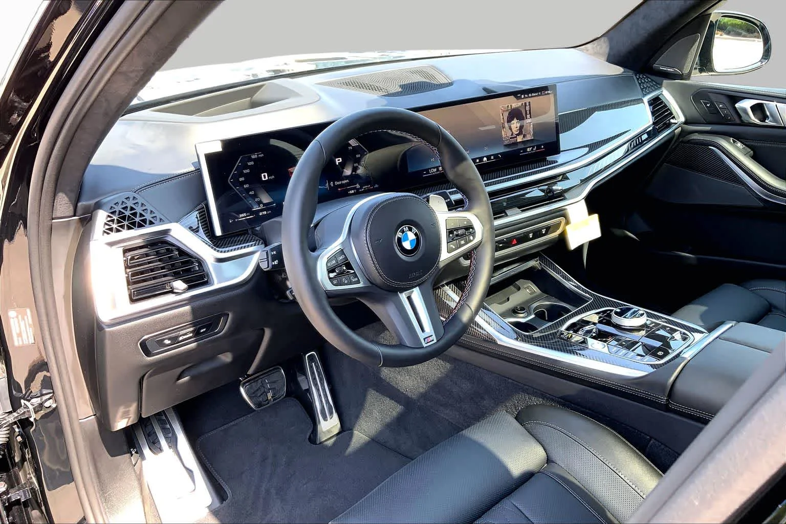 New 2026 Black Sapphire Metallic BMW M60i image 8