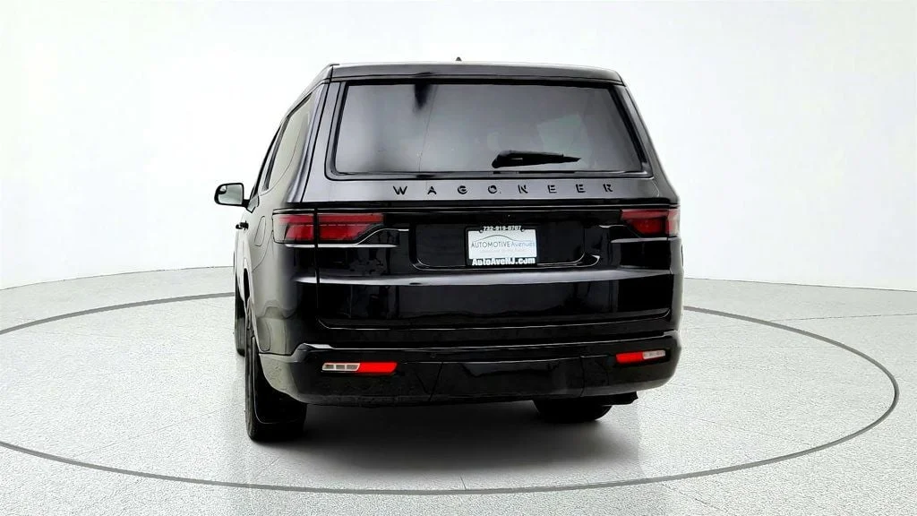 Used 2025 Diamond Black Crystal Pearlcoat Jeep Series II Carbide 4x4 w/ Rear Entertainment & 20