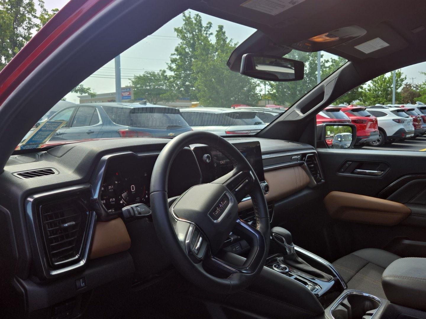 Used 2025 Volcanic Red Tintcoat GMC 4WD AT4 image 2