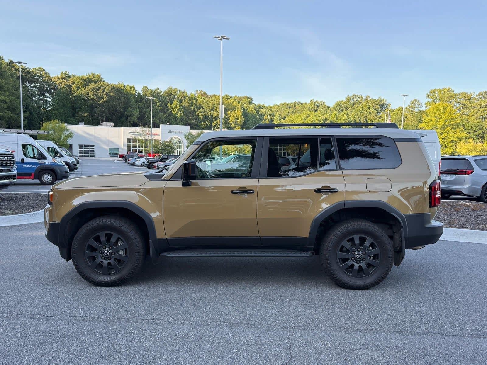 Used 2024 Trail Dust w/Grayscape Roof Toyota BASE image 2
