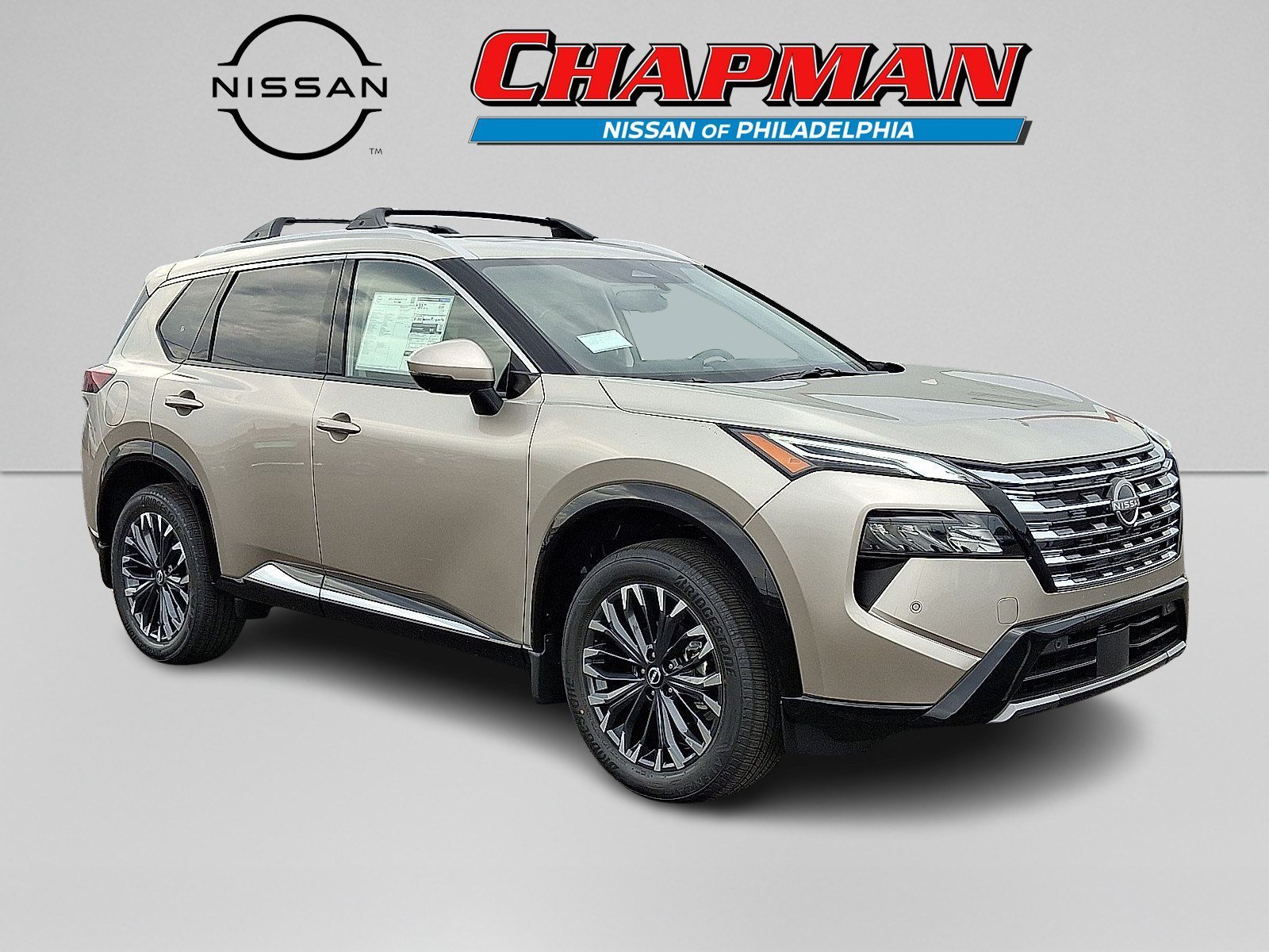 New 2026 Champagne Silver Metallic Nissan Platinum image 1