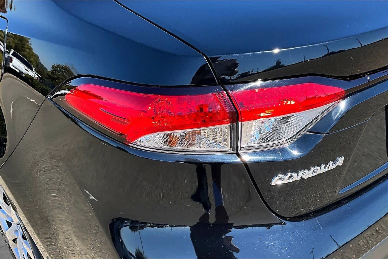 Used 2023 Midnight Black Metallic Toyota LE image 28