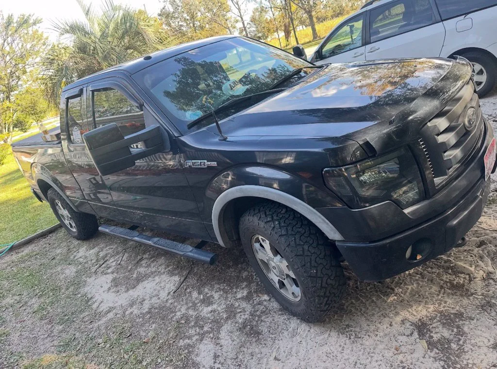 Used 2010 Black Ford XL image 1