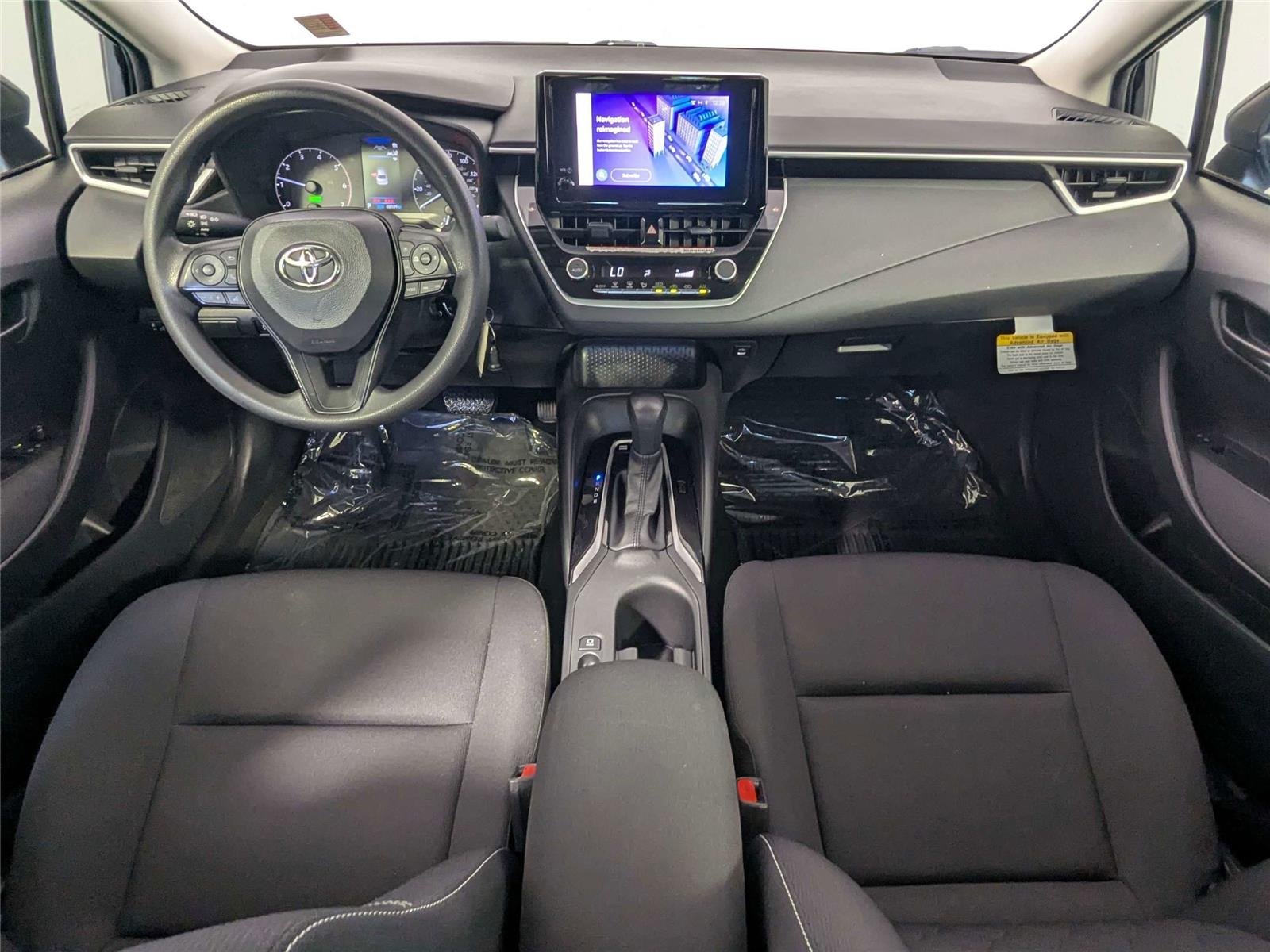 Certified Used 2024 Midnight Black Metallic Toyota Hybrid LE image 9