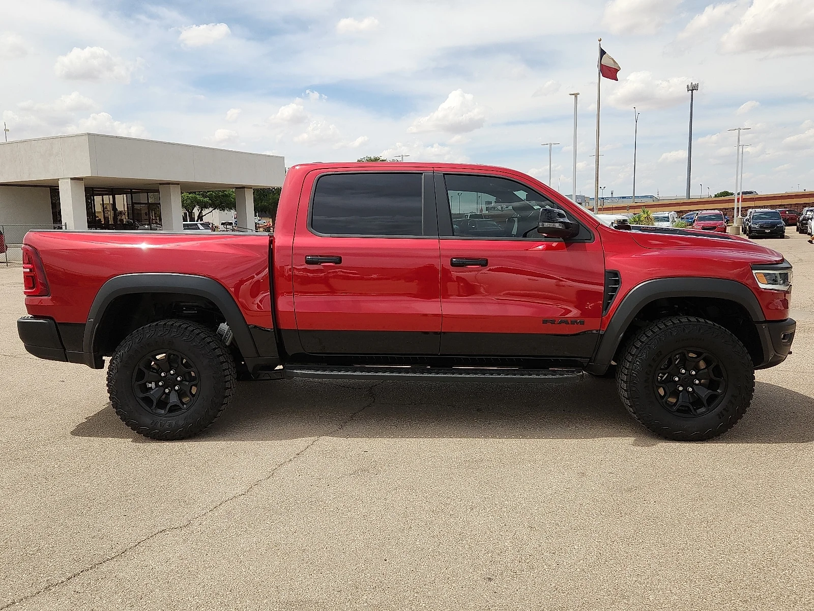 New 2026 Molten Red Pearl-Coat  Paint Ram RHO CREW CAB 4X4 5