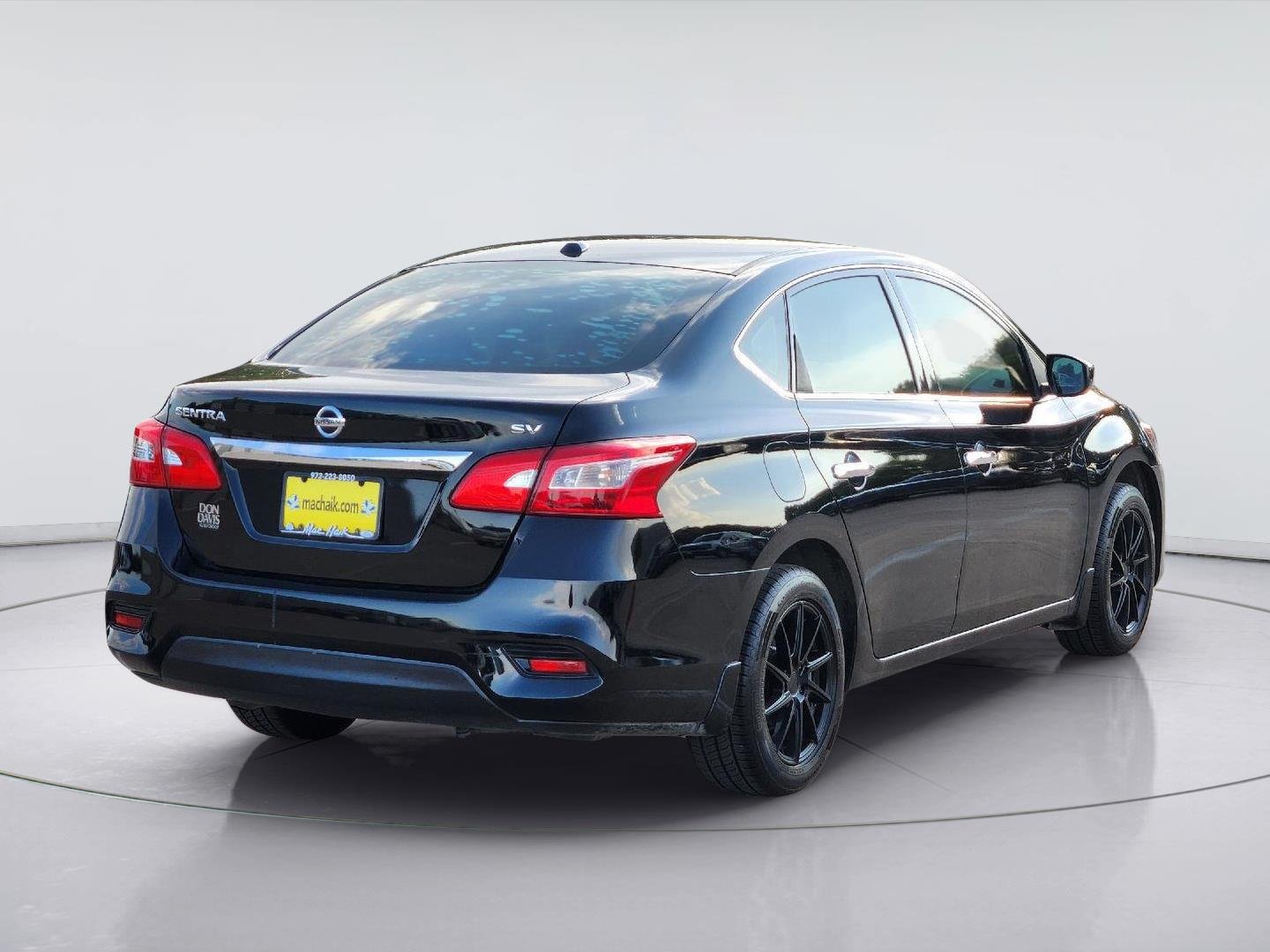 Used 2016 Super Black Nissan SV image 6
