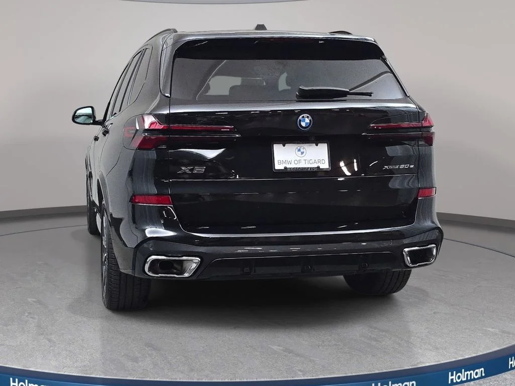 Used 2026 Black Sapphire Metallic BMW xDrive50e image 7
