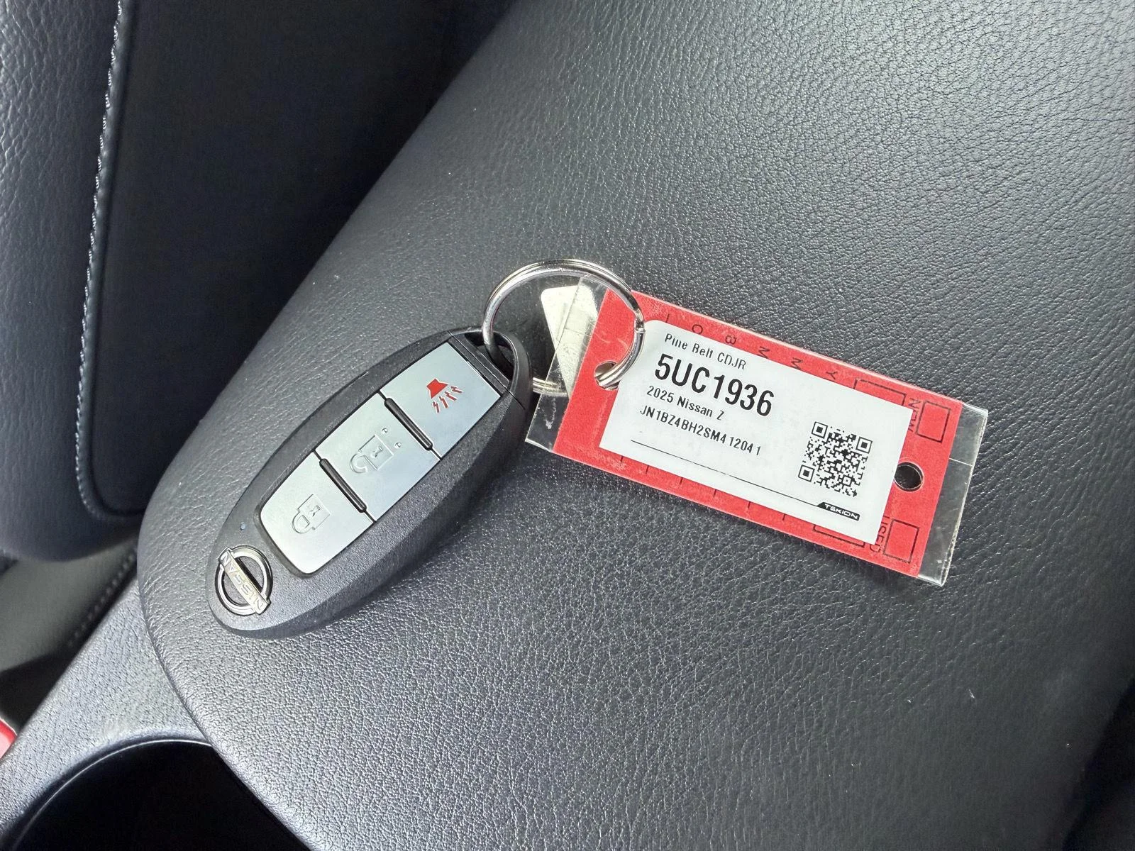 Used 2025 Solid Red/Super Black Nissan Performance image 13