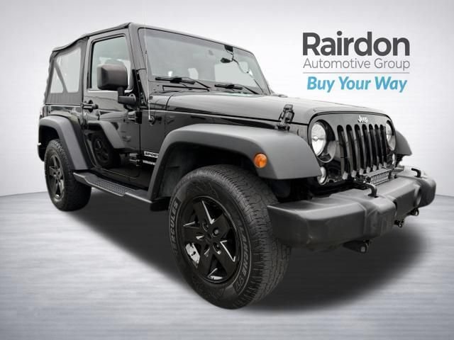 Used 2017 Black Clearcoat Jeep Sport image 1