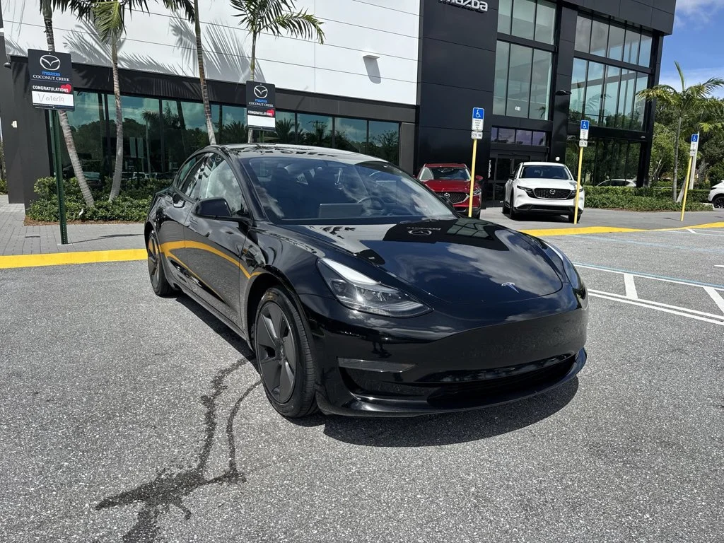 Used 2023 Solid Black Tesla  image 7