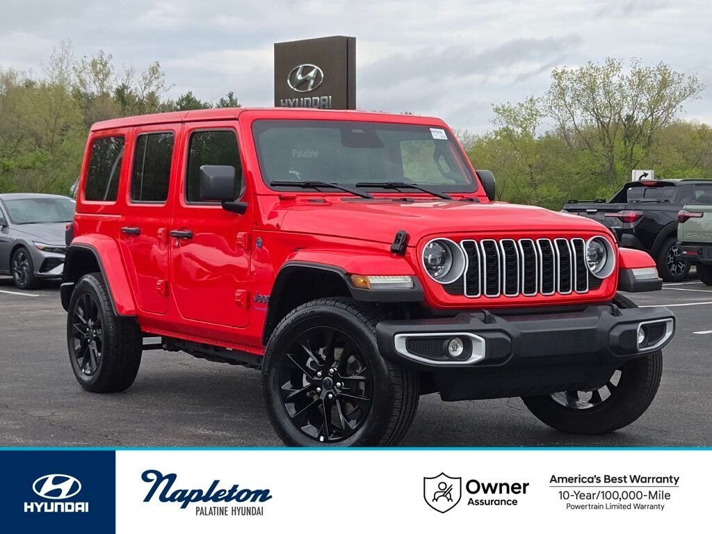 Used 2025 Red Jeep Sahara 4xe image 1