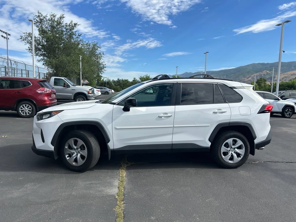 Used 2021 Super White Toyota LE image 13
