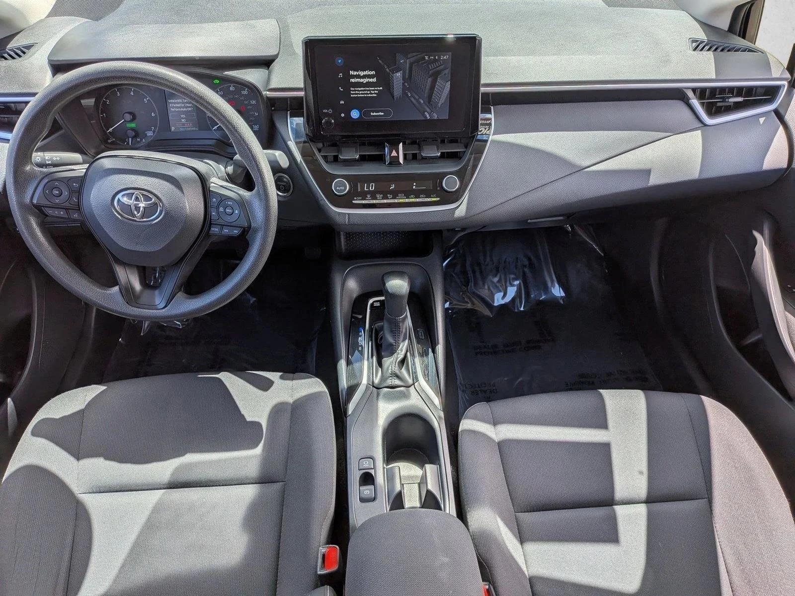 Used 2024 Midnight Black Metallic Toyota Hybrid LE image 14