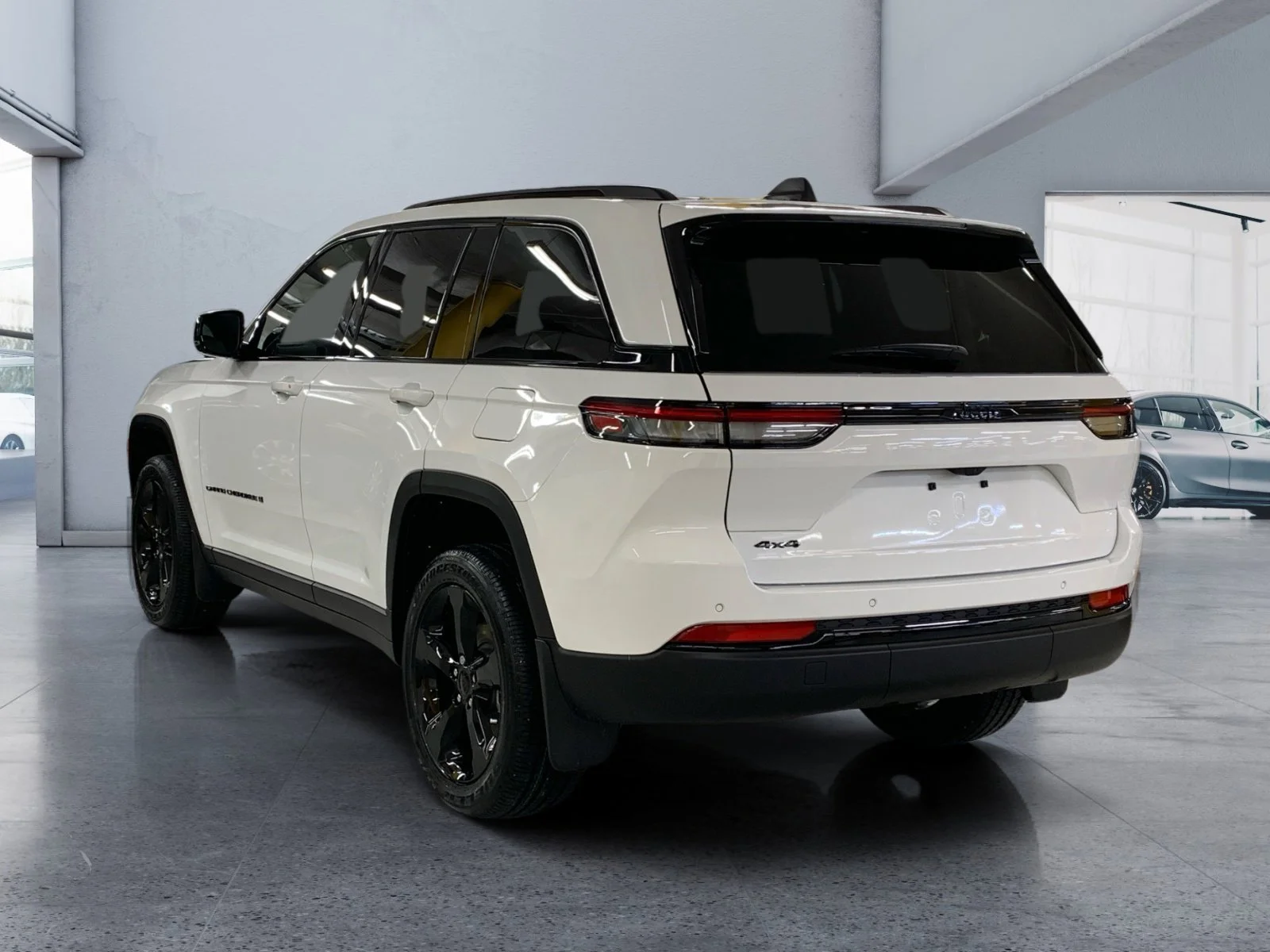 New 2025 Bright White Jeep Altitude image 3
