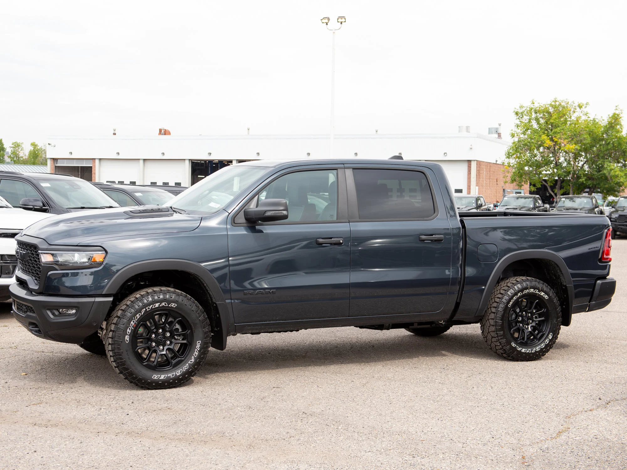 New 2026 Blue RAM Rebel* Crew Cab 4x4, Heated Seats/Wheel, 33 Inch A/T Tires, 1 Inch Factory Suspension Lift image 5