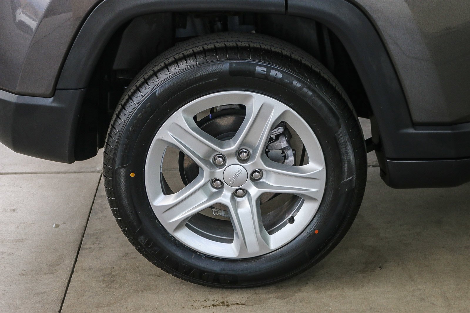 Used 2023 Granite Crystal Metallic Clearcoat Jeep Sport image 10