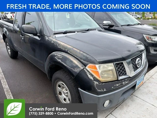 Used 2006 Super Black Nissan XE image 1