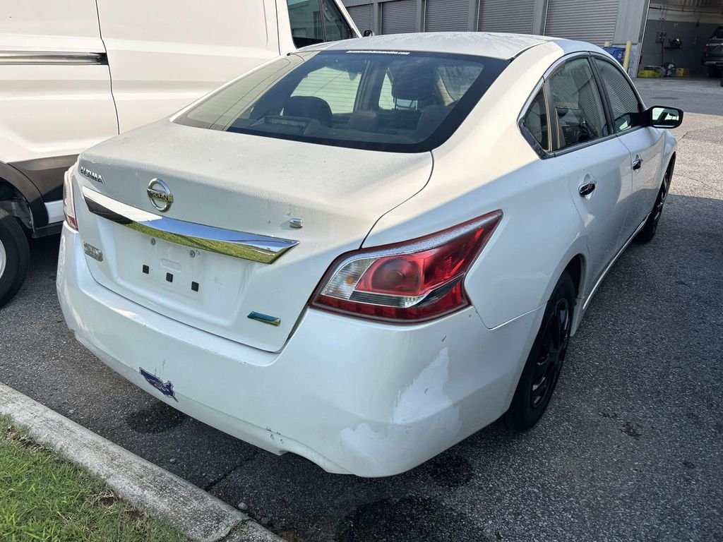 Used 2013 Pearl White Metallic Nissan 2.5 S image 3