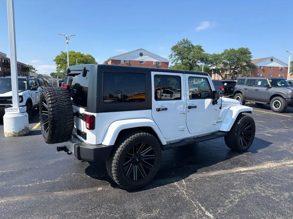 Used 2015 White Jeep Unlimited Sahara image 5