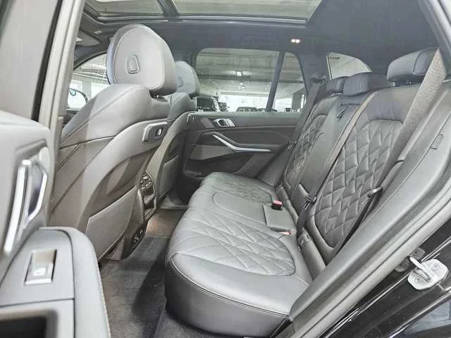 Used 2025 Black Sapphire Metallic BMW xDrive50e image 25