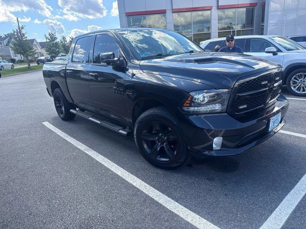 Used 2018 Brilliant Black Crystal Pearlcoat Ram Night image 1