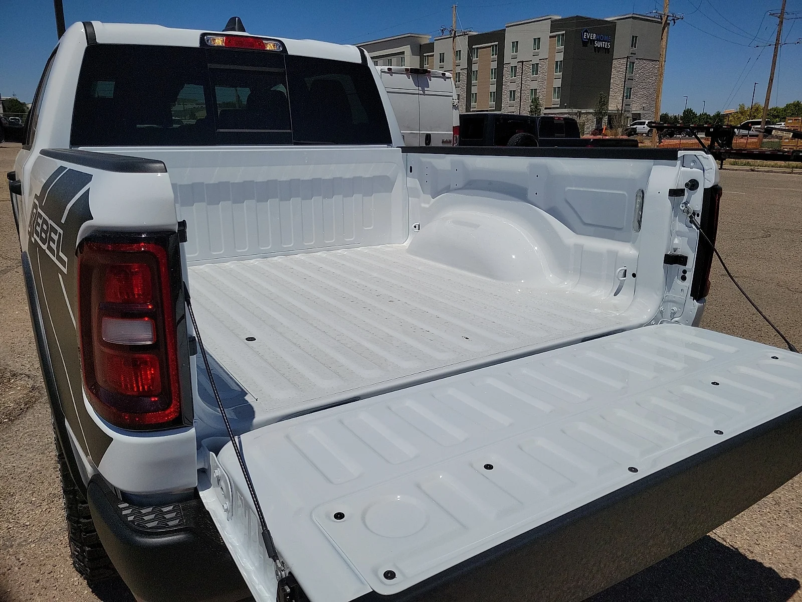 New 2026 PW7 Bright Whit Ram REBEL CREW CAB 4X4 5