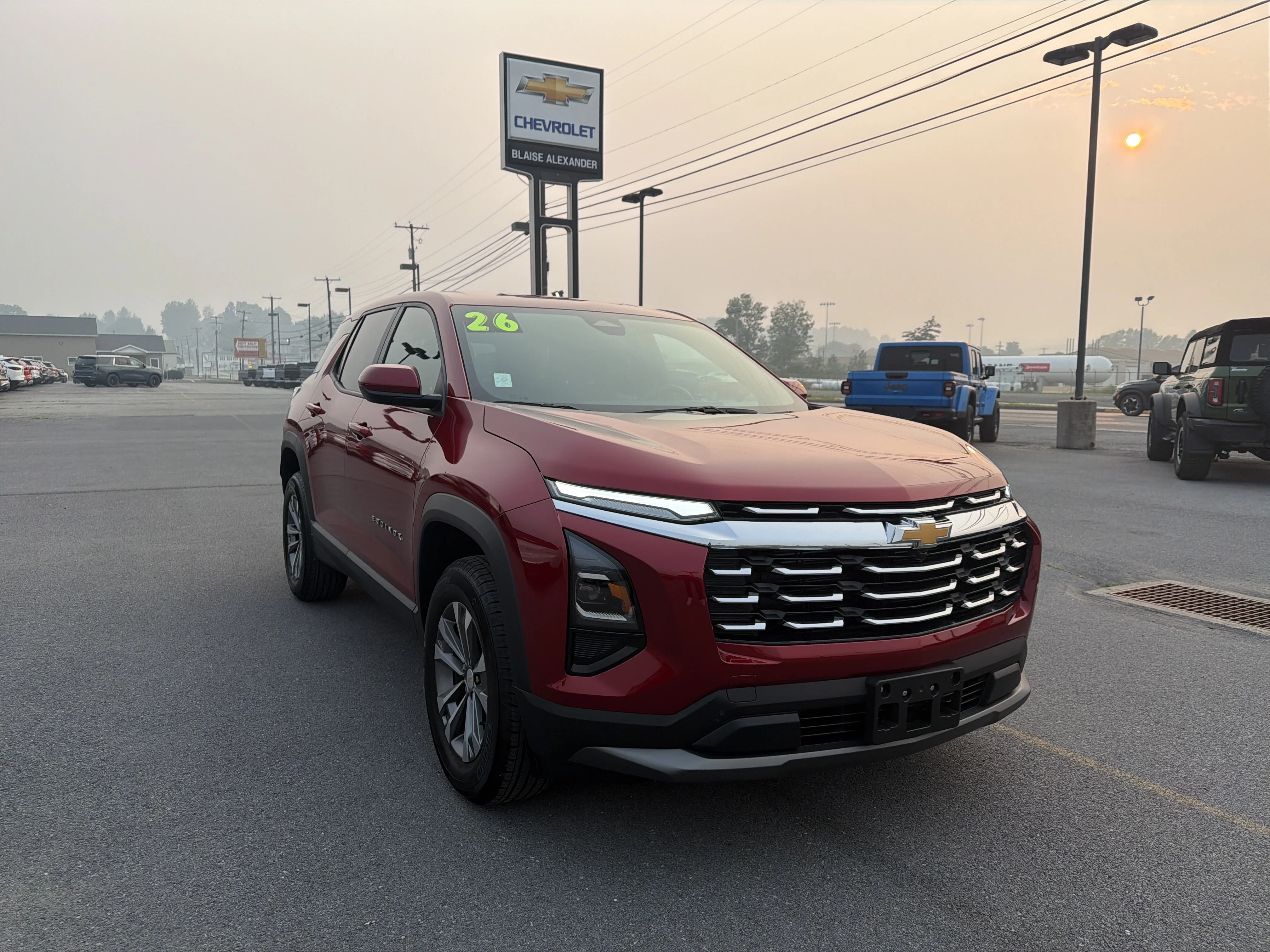 Used 2026 Radiant Red Tintcoat Chevrolet AWD LT image 1