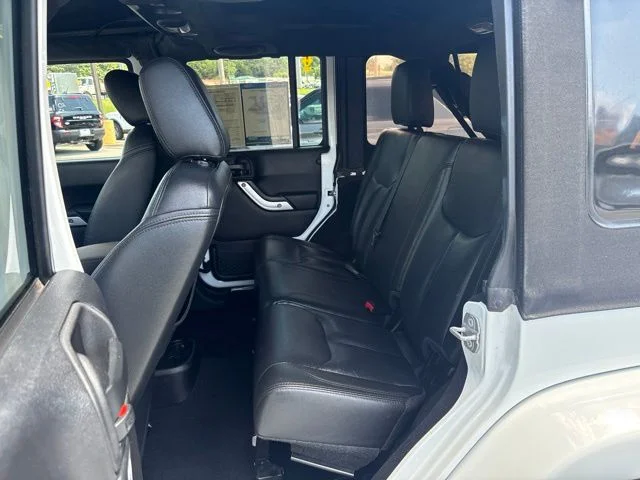 Used 2014 White Jeep Unlimited Sahara image 24