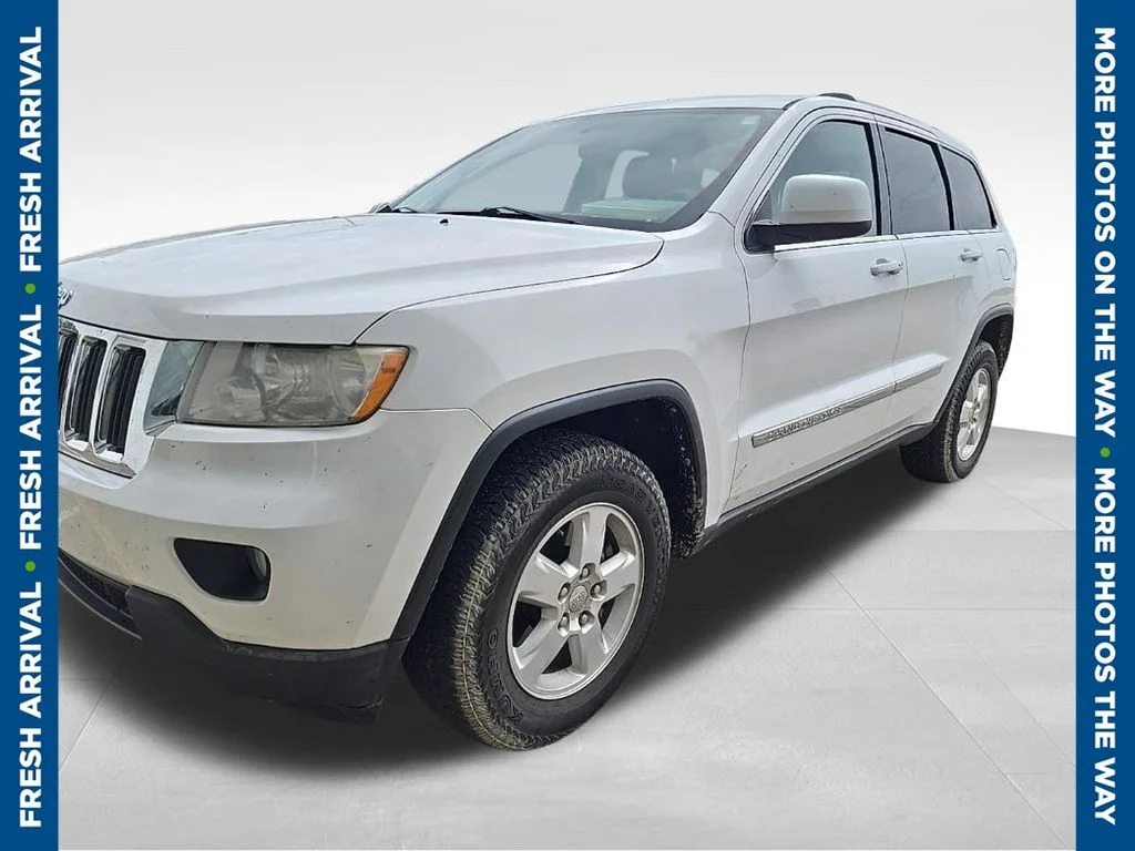 Used 2013 White Jeep Laredo image 1