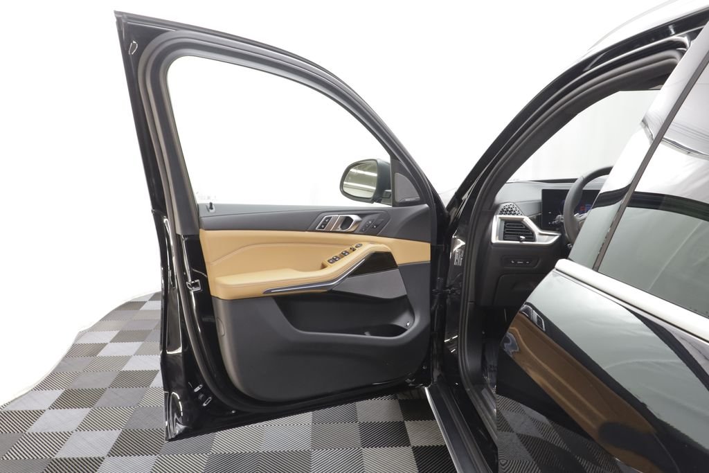 New 2026 Black Sapphire Metallic BMW xDrive50e image 6