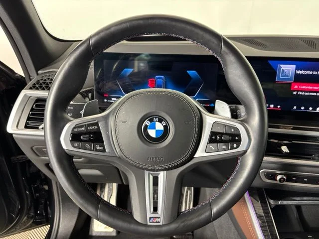Certified Used 2025 Black Sapphire Metallic BMW M60i image 12