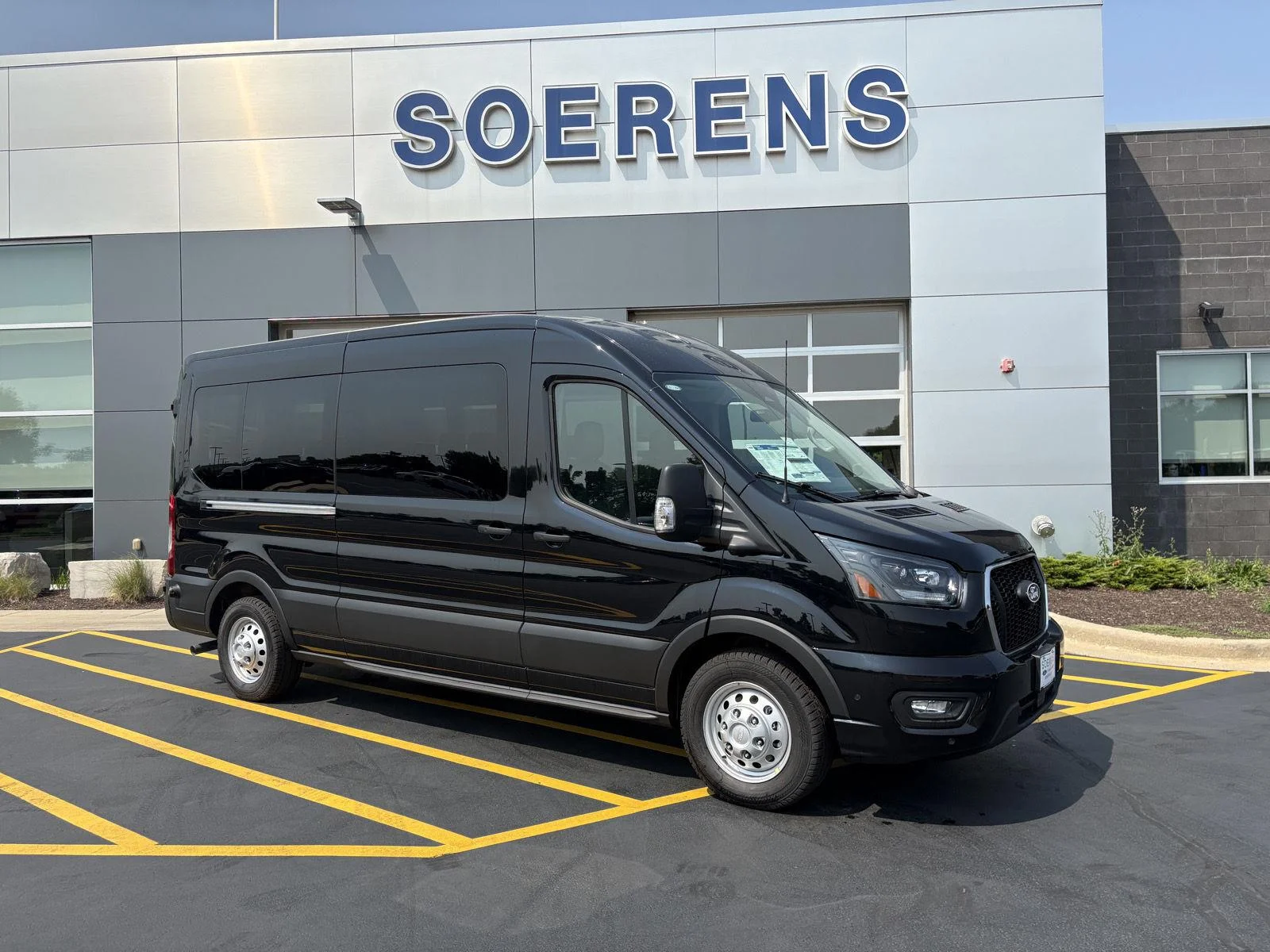 New 2026 Agate Black Metallic Ford Passenger Van XLT image 1