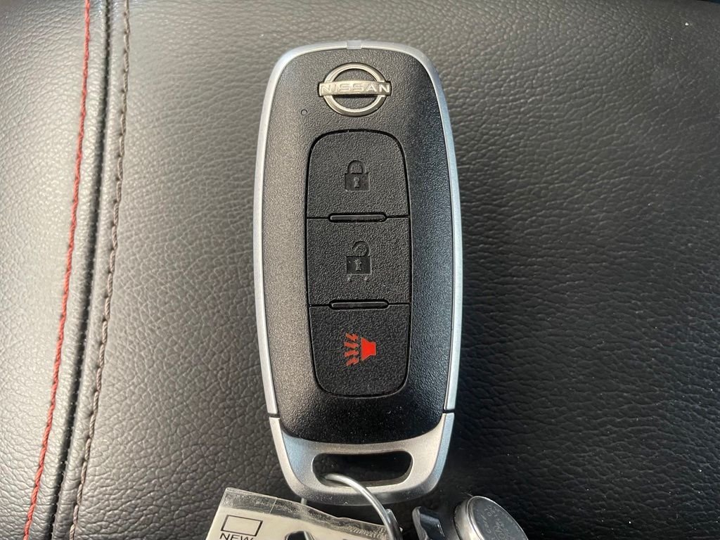 Certified Used 2025 Red Nissan SR image 18