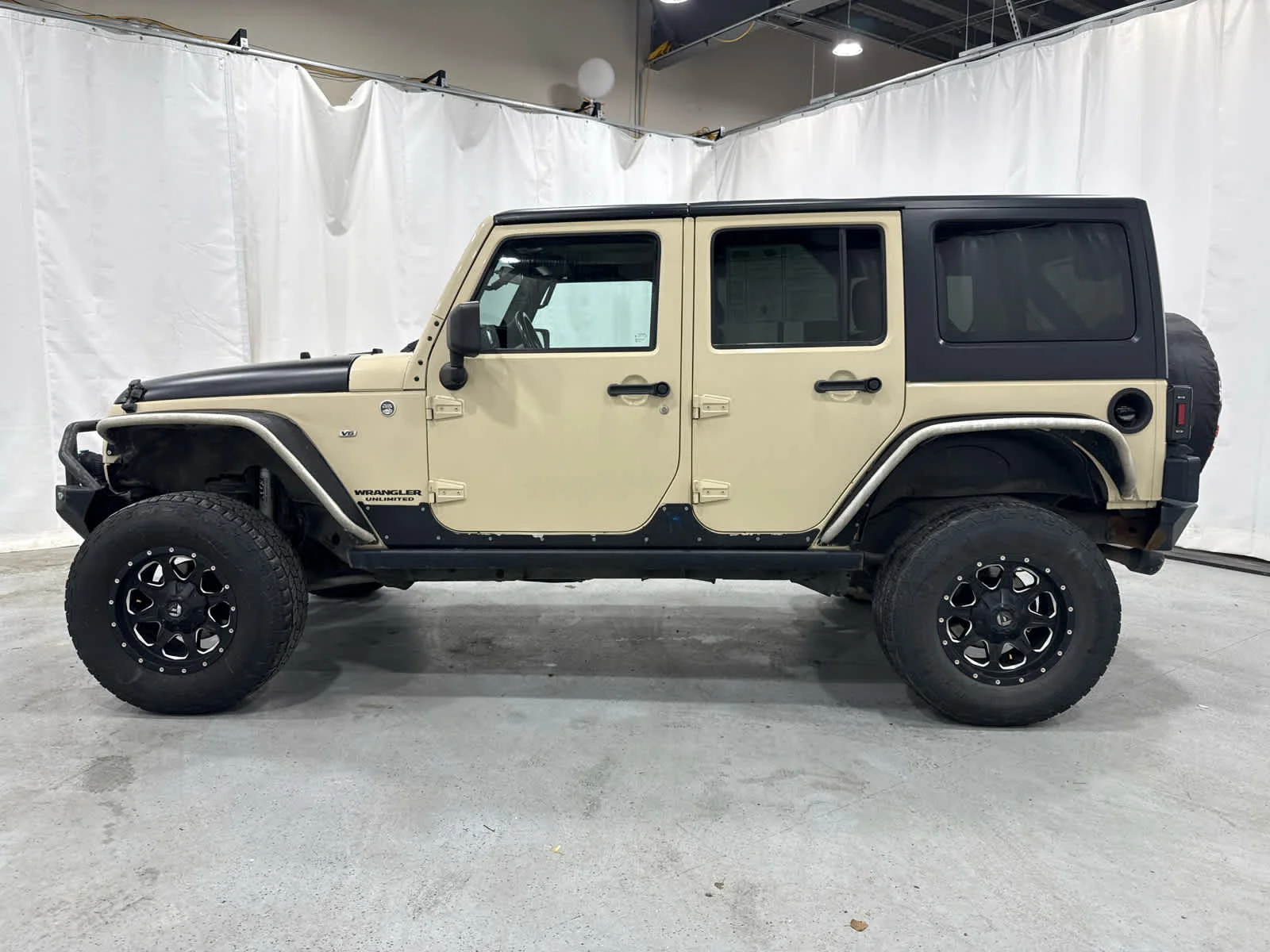 Used 2012 Tan Jeep Rubicon image 2
