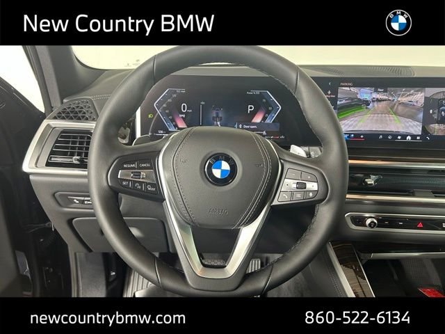 New 2026 Black Sapphire Metallic BMW xDrive40i image 12