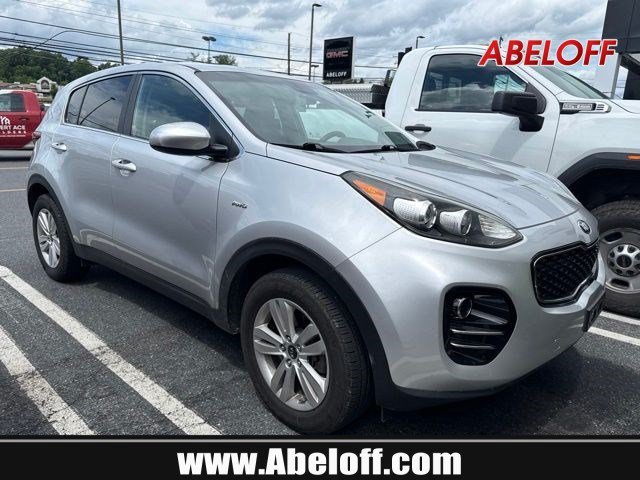 Used 2019 Sparkling Silver Kia LX image 1
