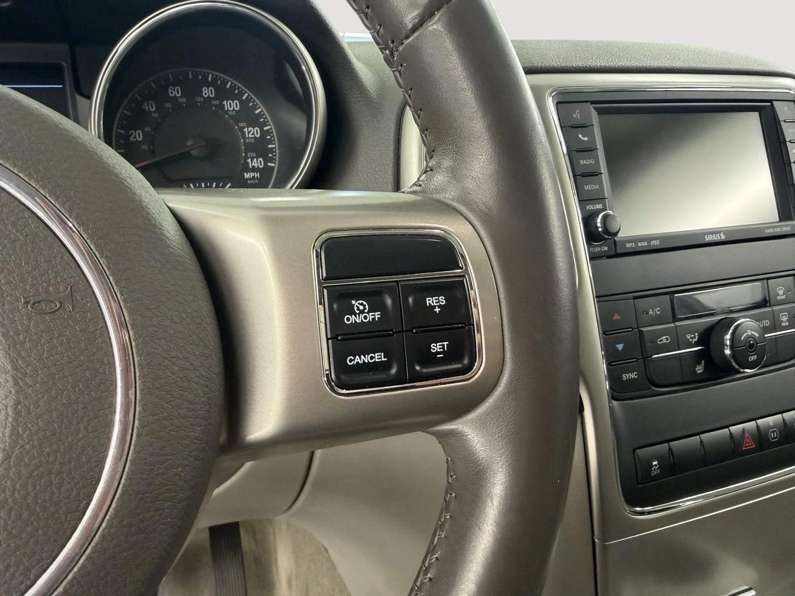 Used 2011 Dark Charcoal Pearl Jeep Laredo image 16