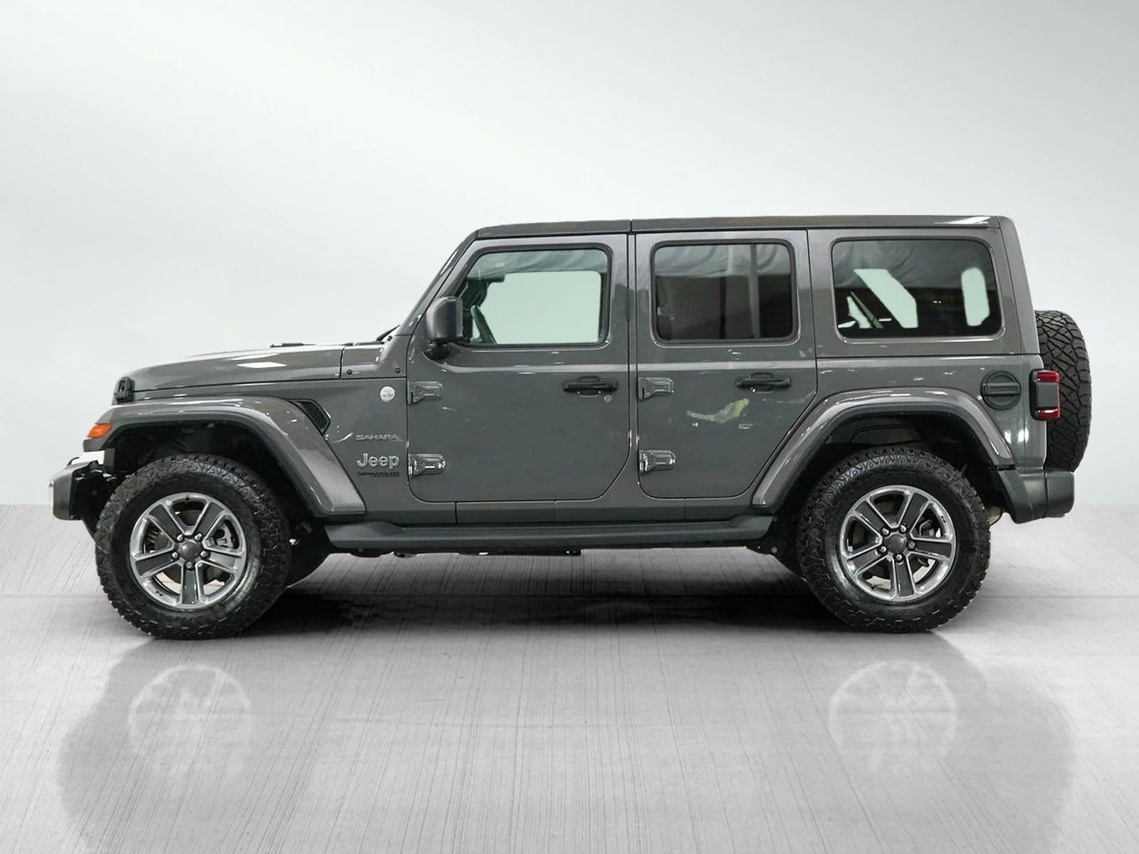 Used 2019 Jeep Wrangler Unlimited Sahara with VIN 1C4HJXEG5KW583163 for sale in Minneapolis, Minnesota