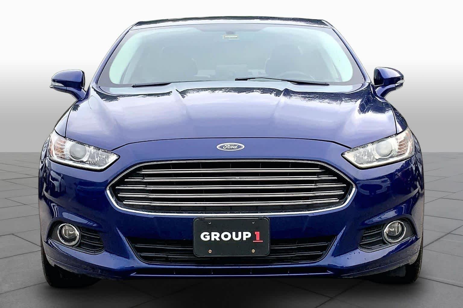 Used 2013 Deep Impact Blue Ford SE image 4