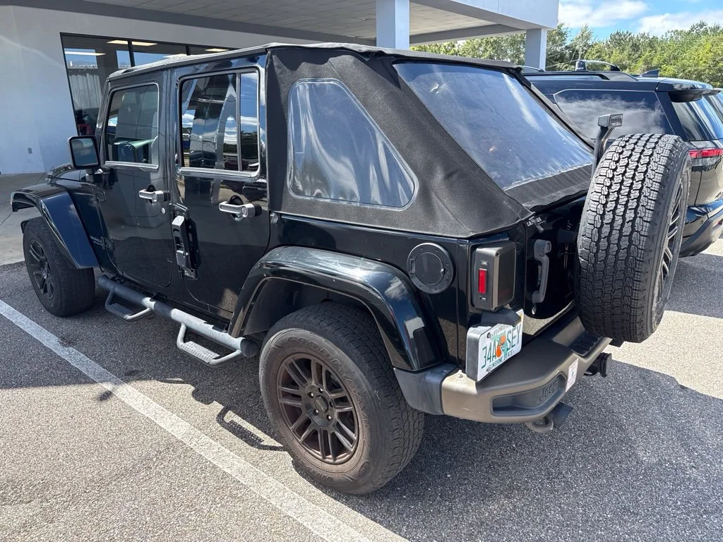Used 2017 Black Jeep Unlimited Sahara image 6
