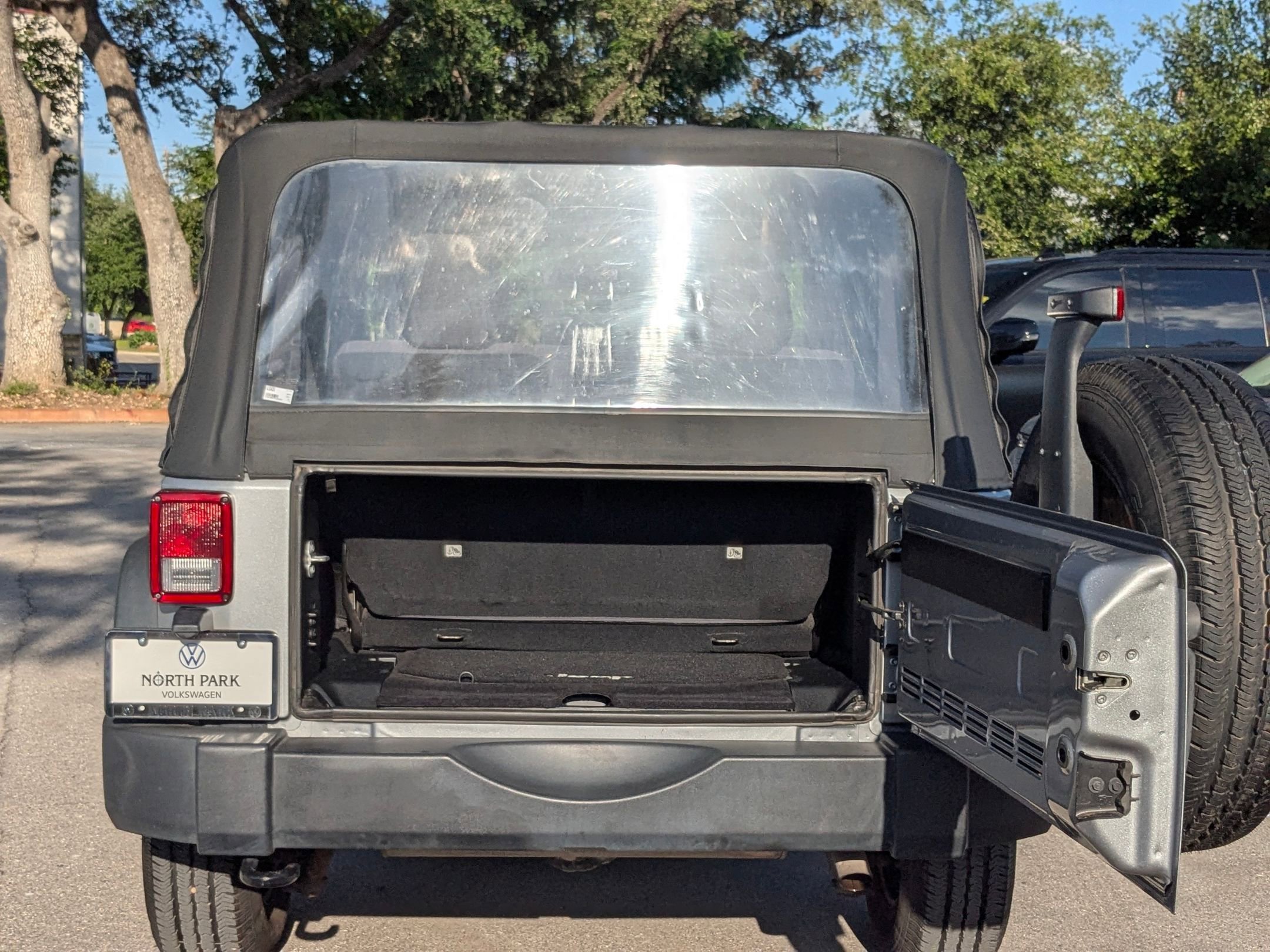 Used 2015 Billet Silver Metallic Clearcoat Jeep Sport image 20