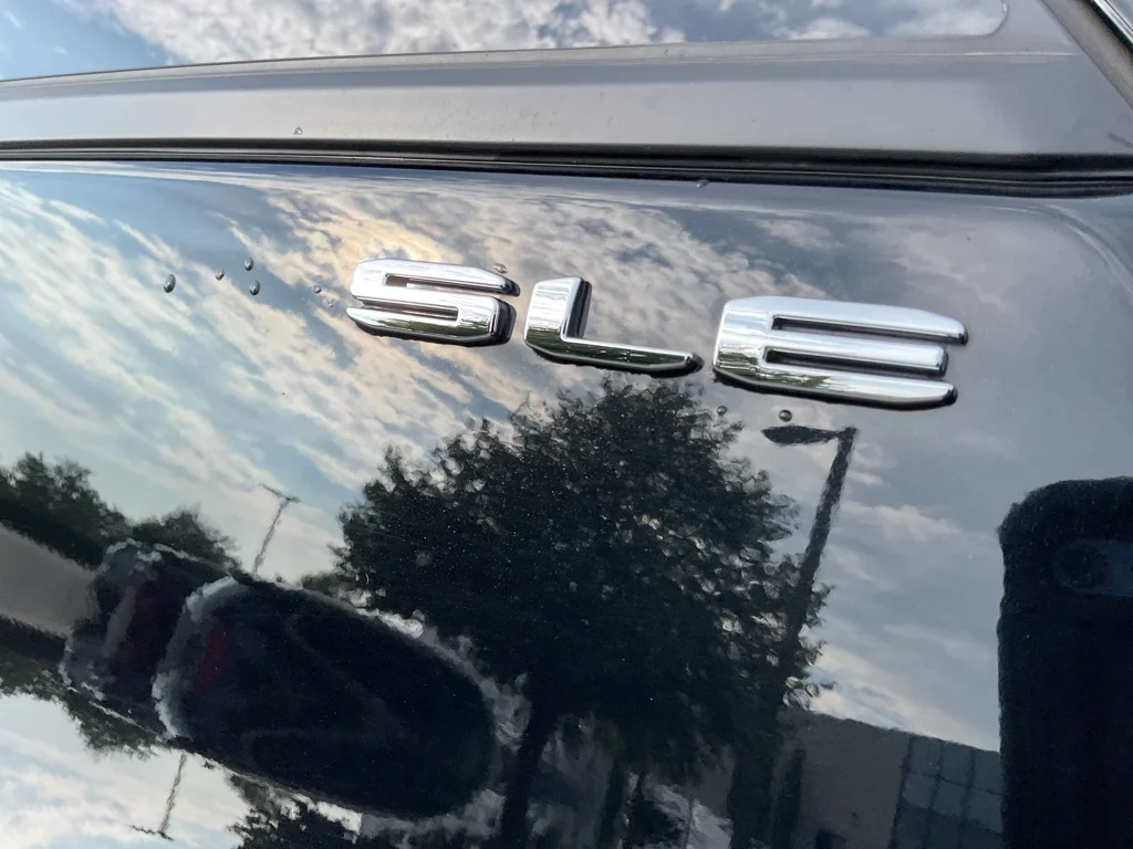 Used 2024 Ebony Twilight Metallic GMC SLE image 7